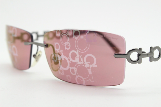 Salvatore Ferragamo Y2K Vintage Sunglasses Model 1045. Frameless Pink Wraparound Lenses With Mirror Print & Stirrup Chain Arms. 2000S