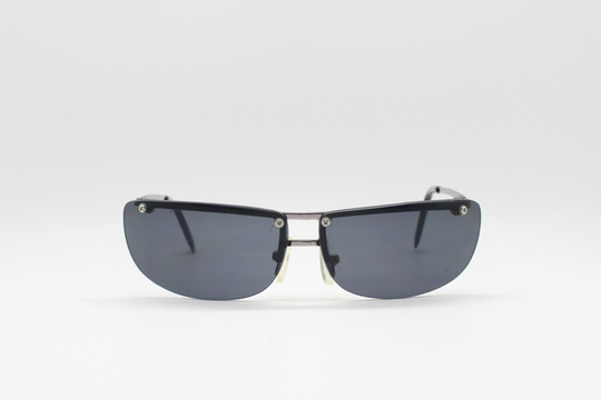 Kid's Vintage Y2K Sunglasses. Frameless Dynamic Black Wraparound Lenses On Gunmetal Brow Line. Childrens 2000S. Suitable For Toddlers