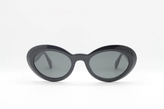 90S Vintage Sunglasses. Nos Made in Italy. Medium Sized Womans 60S Style Oval Cat Eye Jet Black With Dark Grey Lenses. Bnwt. Mod