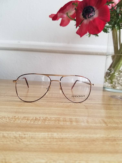 Albert Eyeglasses 1980S New Old Stock .model Madonna . Universal Frame Italy. Very Light. Col. Gold/Brown Tortoise. Dim. 55x16x140