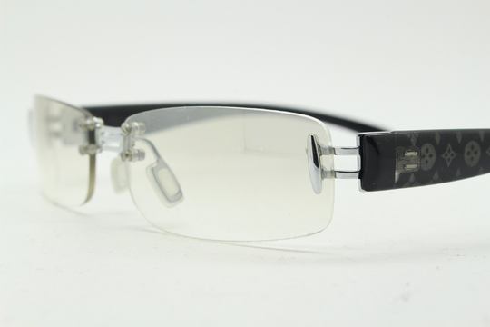 Y2K Vintage Frameless Sunglasses. Silver Chrome Trim With Patterned Arms & Extra Light Tone Graduated Curved Mirror Lenses. 2000's. 90S
