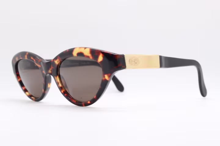 Blumarine 90S Vintage Sunglasses Model Bm 564 Made in Italy. Oval Cat Eye Acetate Frame With Big Gold Metal Crests. Nos Cateye